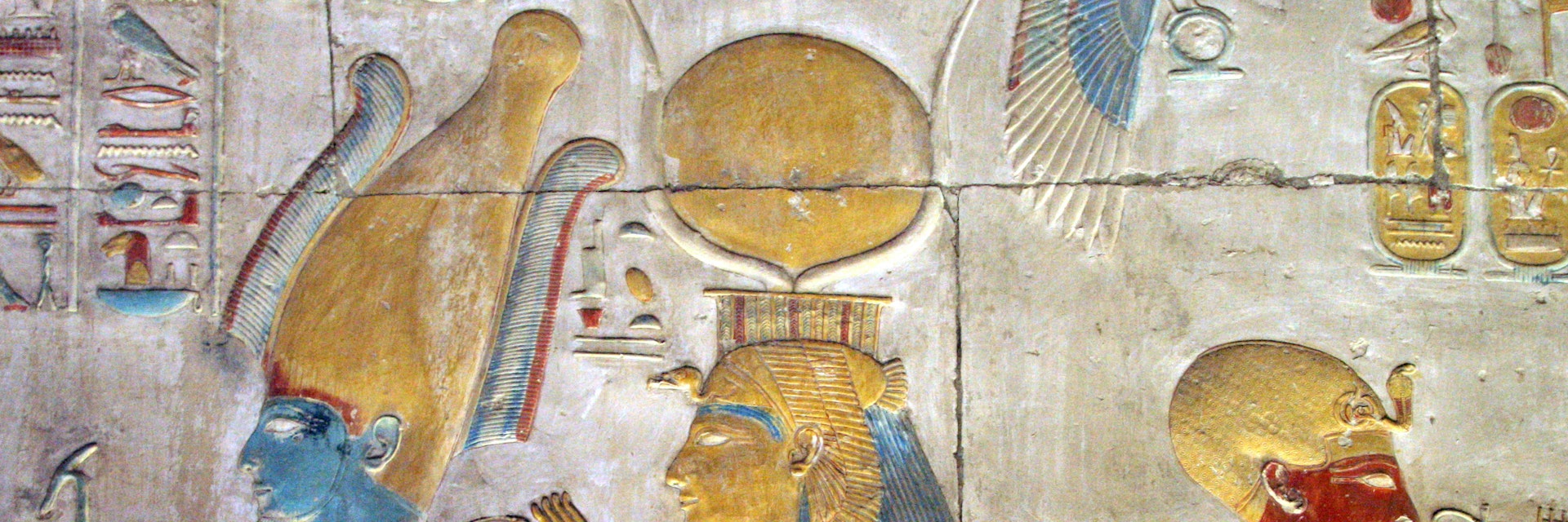 Painted bas relief of Osiris and Isis wearing the headdress of Hathor at the Temple of Seti I.
160374862
Abydos; Art And Craft; AutotagModeratelyStock - Do Not Delete; Bas Relief; Close-up; Color Image; Creativity; Egypt; Female Likeness; Flickr; Hathor; Headdress; History; Horizontal; Human Representation; Indoors; Isis - Egyptian Goddess; Male Likeness; Middle East; No People; Osiris; Paintings; Photography; Religion; Seti I; sohag governorate; Temple - Building; The Past; Wall - Building Feature;