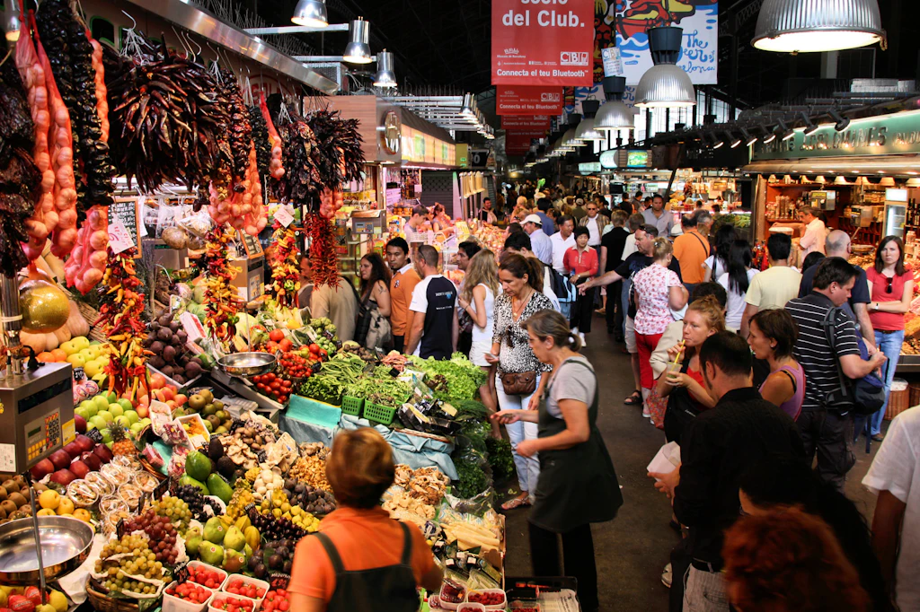 La Boqueria market in Barcelona Tourists filling the aisles at the famous La Boqueria market in Barcelona.
