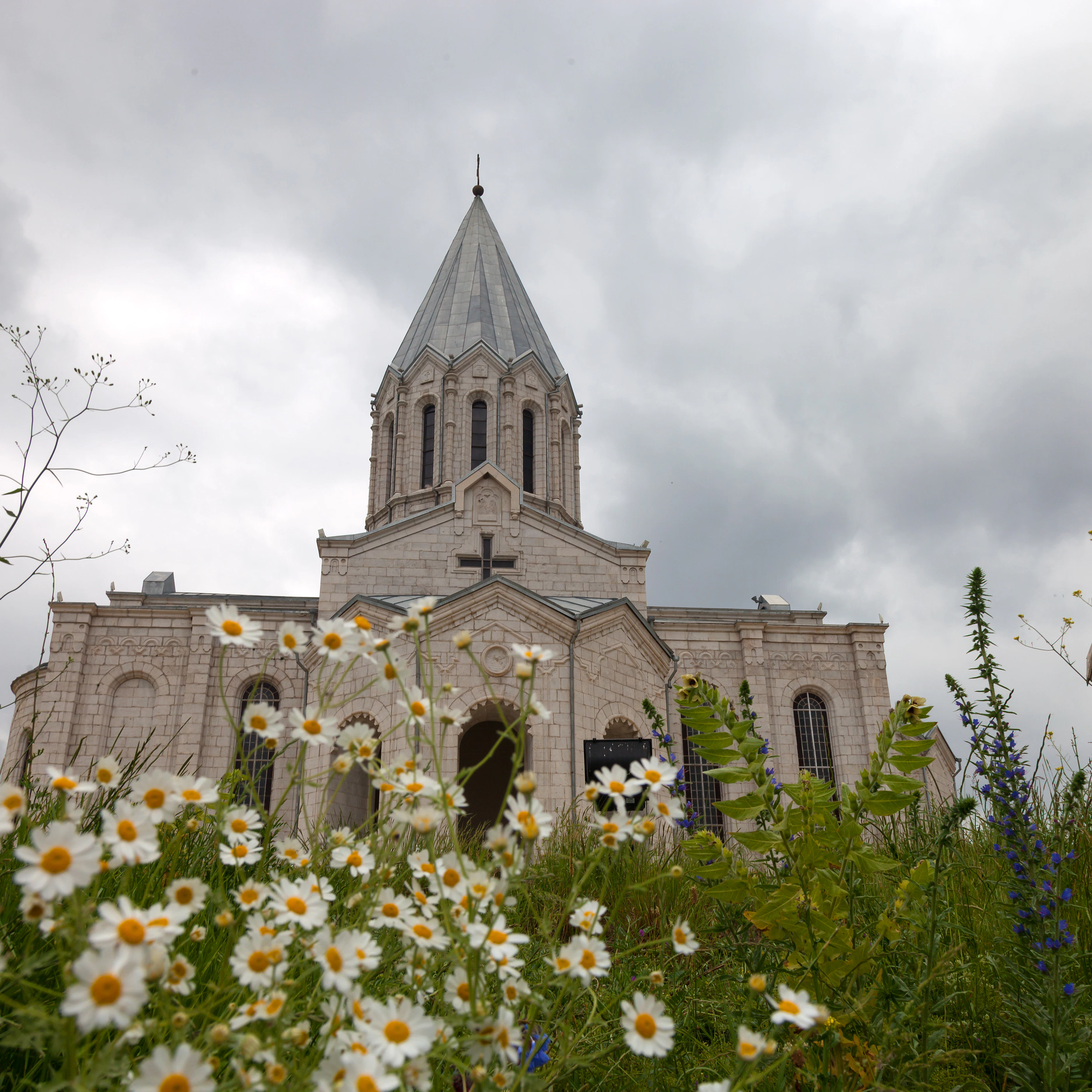 Exterior of Surb Chazanchetsots church with chamomile flowers.
500845580
Cathedral, No People, Horizontal, Nagorno-Karabakh, Armenia - Country, National Landmark, Photography, Church, Monastery, 2015, Brown, History, Christianity, Grass, Architecture, Spirituality, Shoushi