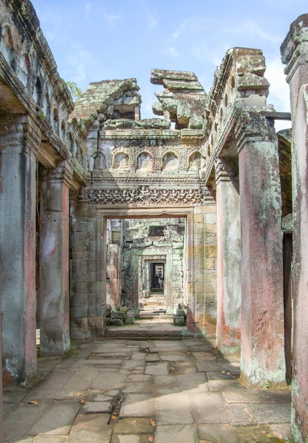 607297572
Spirituality Built Structure Ruined History Architecture Vertical Asia Close-up Cambodia Sculpture Monument Old Ruin Statue Temple - Building Ancient Old Famous Place Cultures Stone Material Angkor Wall - Building Feature Religion Buddhism Art And Craft Art Craft Cambodian Culture East Asian Culture No People Building Exterior Photography Tourism Ancient Civilization Travel Khmer Preah Khan Temple
A stone walkway in the Preah Khan temple in Angkor.