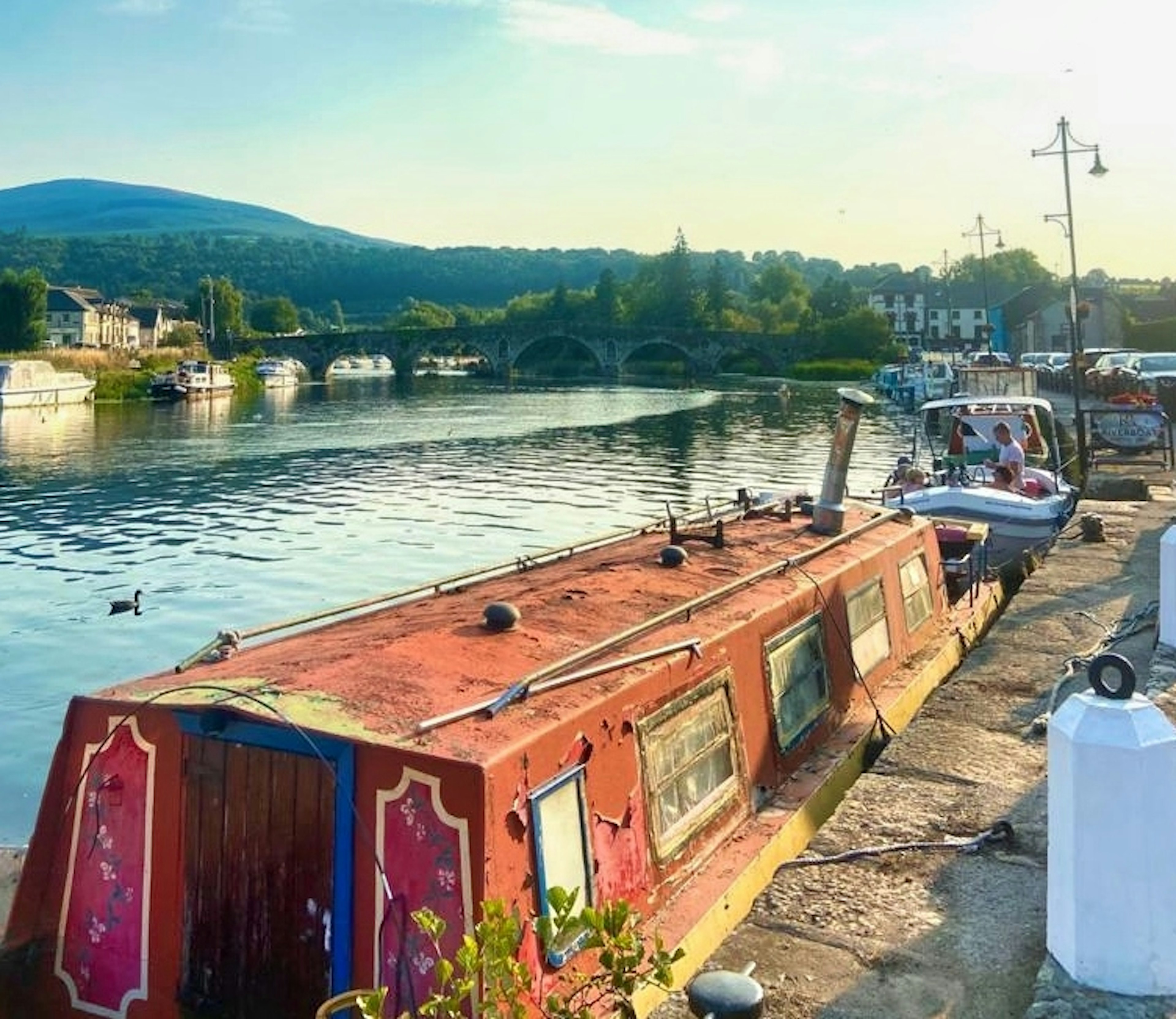 Colorful canal boats along the River Barrow in Graiguenamanagh