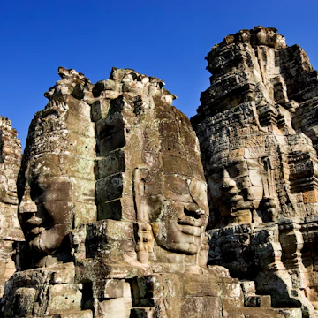 26408-37
Asia, Cambodia, Siem Reap, South-East Asia, aged, ancient, architecture, architecture and art, art, built structure, clear sky, culture, day, epoch, historic, history, horizontal, human representation, low angle view, no people, old, outdoors, past, sculpture, stone
Stone heads, Bayon.