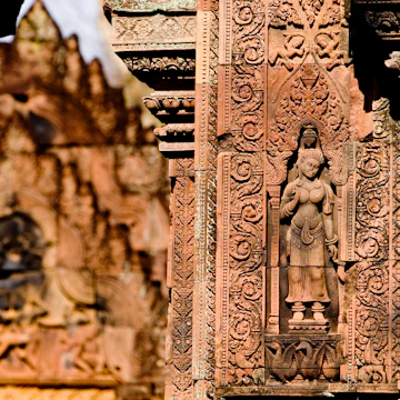 26408-45
Asia, Cambodia, Siem Reap, South-East Asia, aged, architecture, architecture and art, art, built structure, carving, close-up, culture, day, female likeness, focus on foreground, history, horizontal, human representation, no people, old, outdoors, past, sculpture, statue, wall
Bas-relief detail, Banteay Srei.