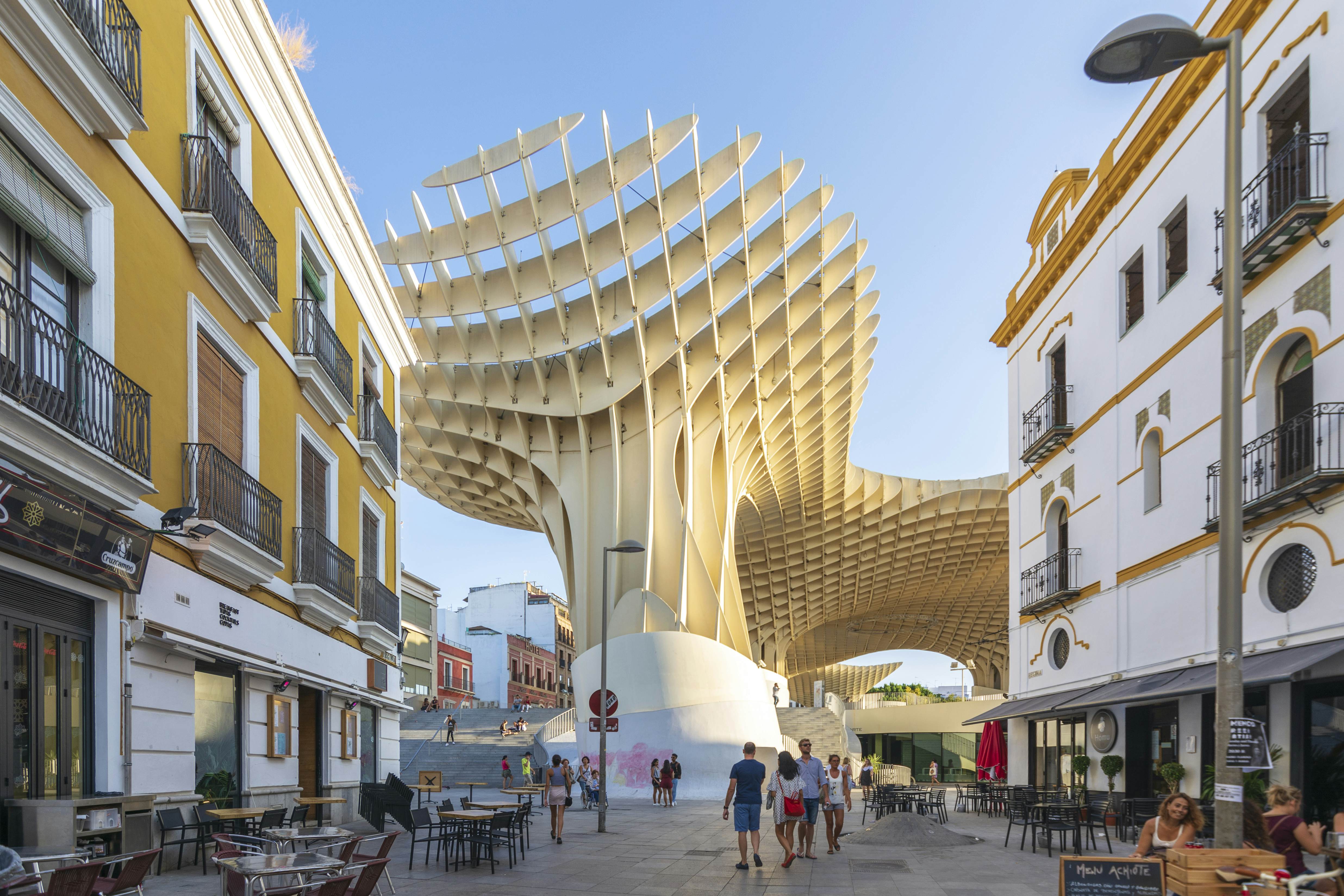 View of Regina street. In the background the Metropol Parasol (by architect Jurgen Mayer H). Taken in the summer of 2018 Sevilla, Spain