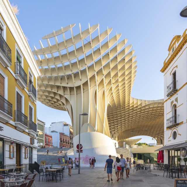 View of Regina street. In the background the Metropol Parasol (by architect Jurgen Mayer H). Taken in the summer of 2018 Sevilla, Spain