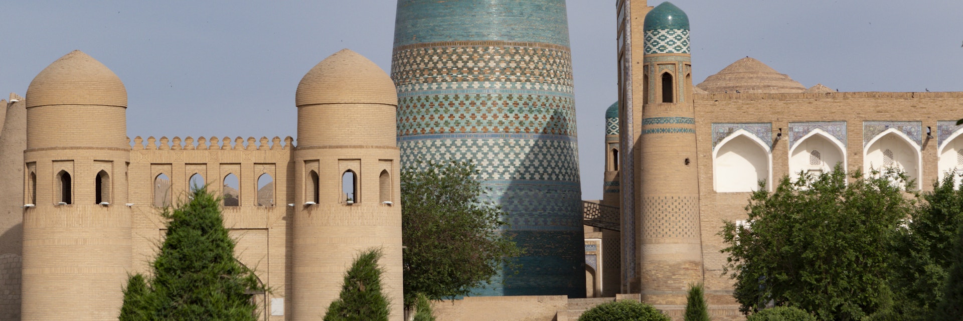 Kalta Minor minaret and city walls in Khiva, Uzbekistan.