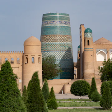 Kalta Minor minaret and city walls in Khiva, Uzbekistan.
