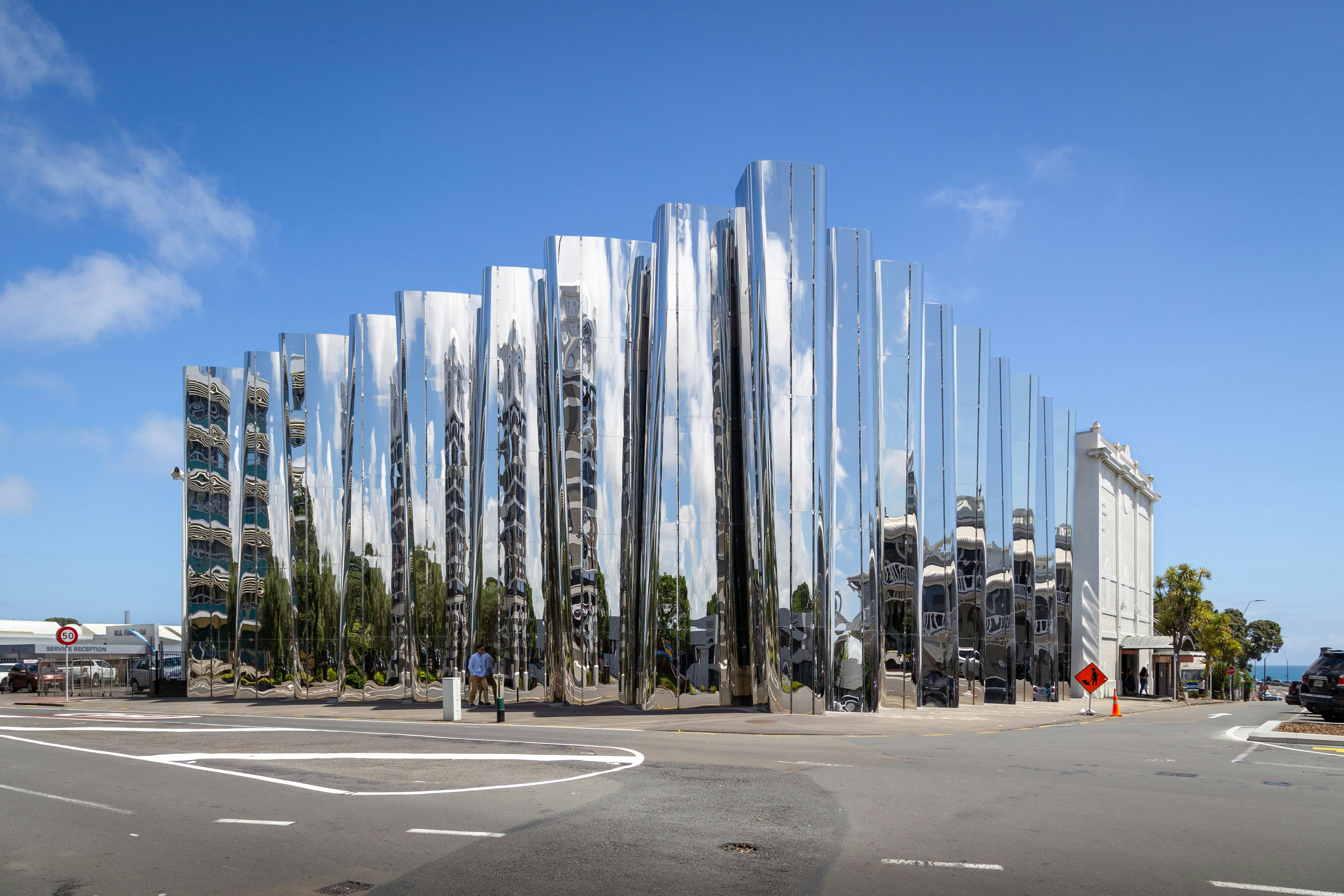Reflective stainless steel facade of the Len Lye Centre/Govett-Brewster Art Gallery in New Plymouth, New Zealand.