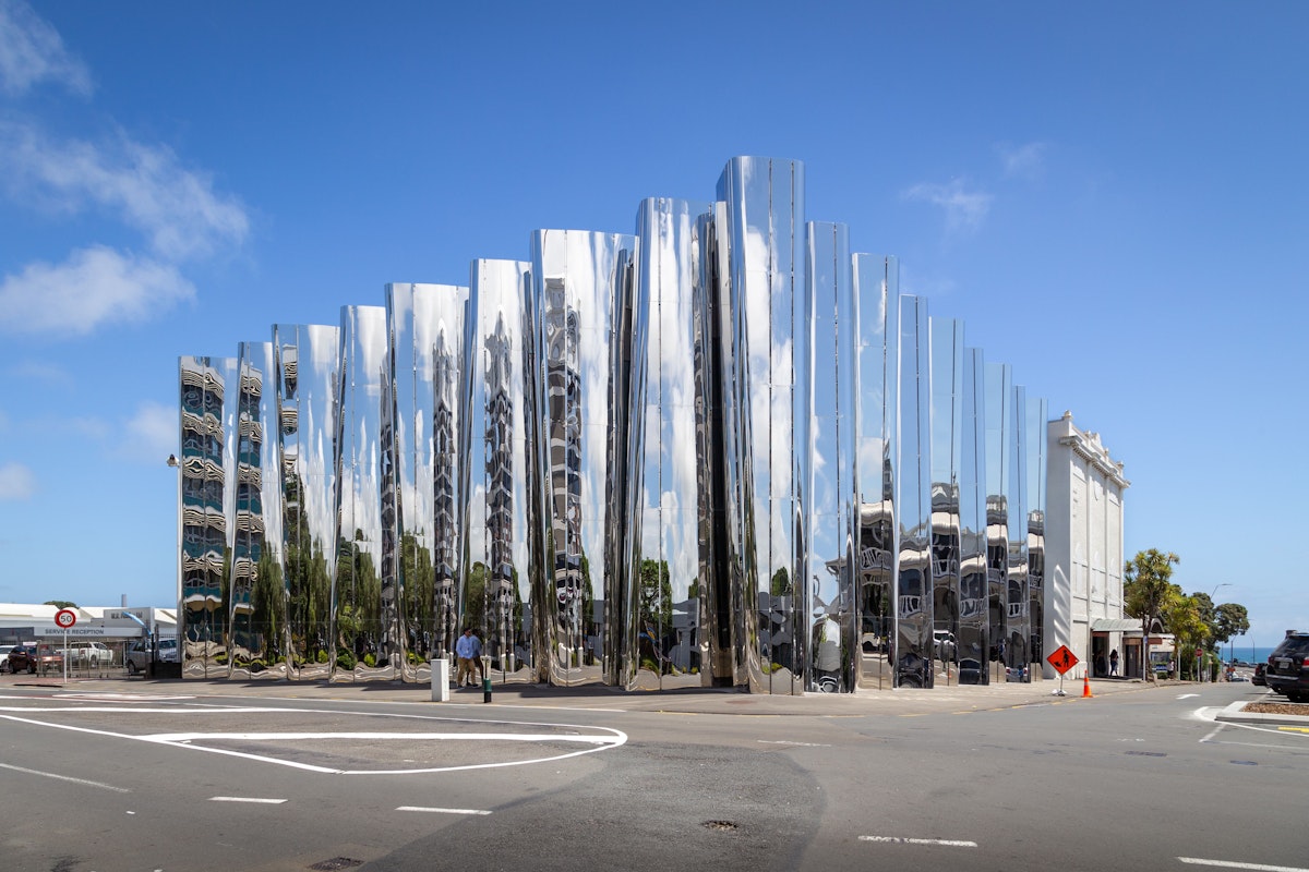 Reflective stainless steel facade of the Len Lye Centre/Govett-Brewster Art Gallery in New Plymouth, New Zealand.