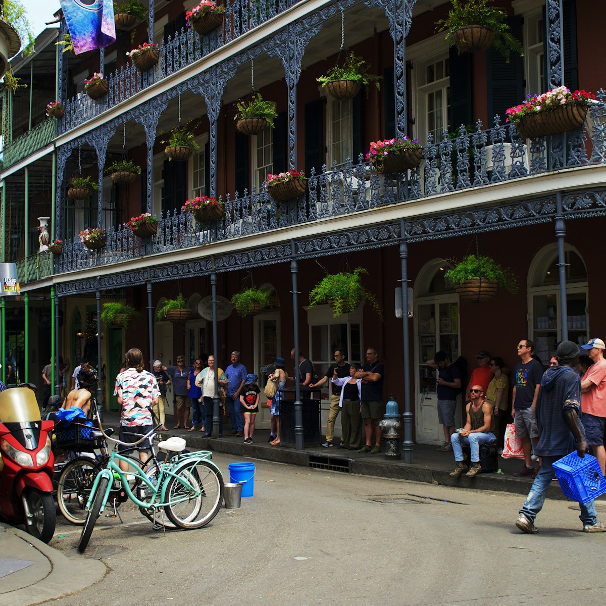 A crowd on Royal Street in the French Quarter of New Orleans.