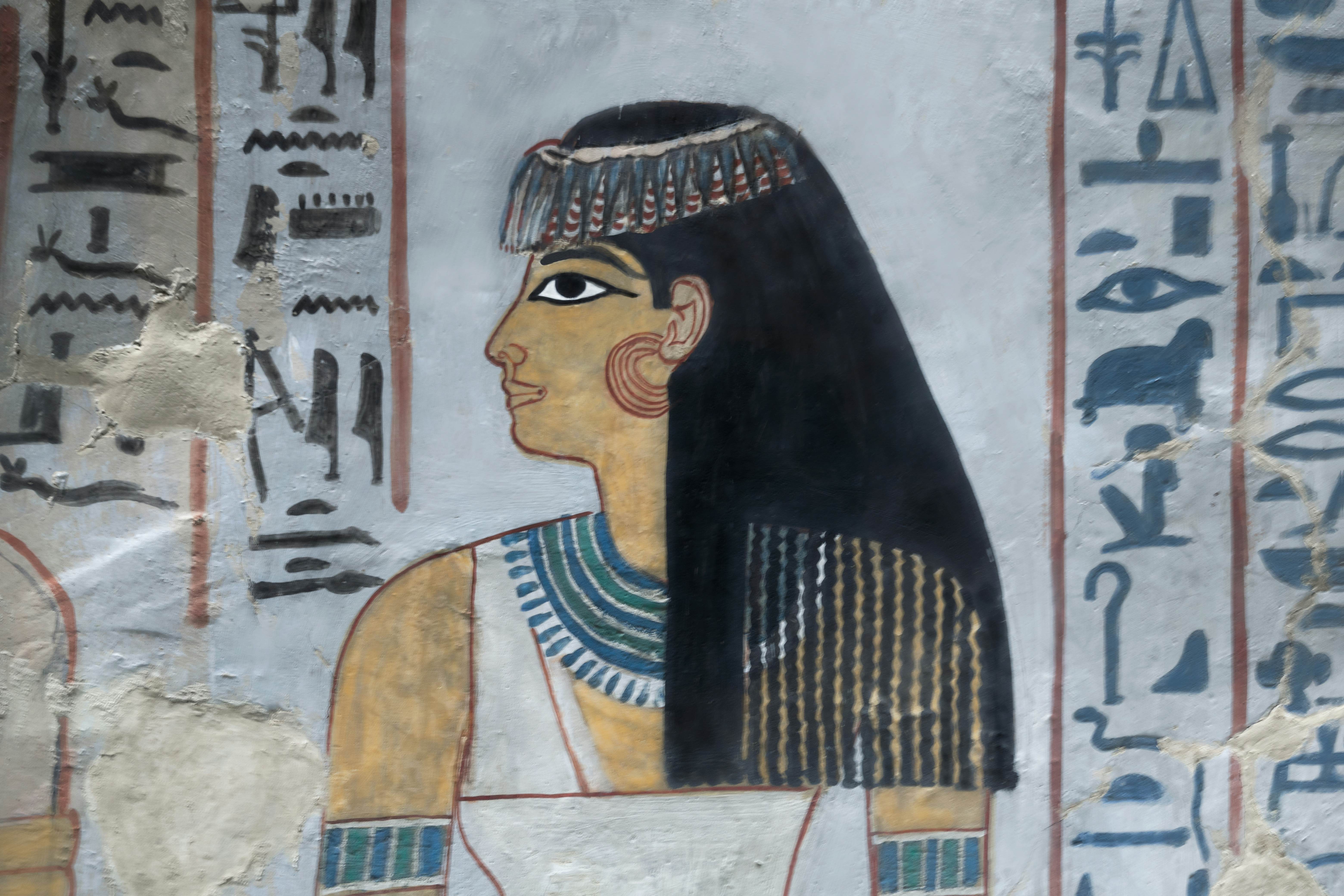 Reliefs showing the mistress of the house and the chantress of Amun at the tomb of Sennefer in Luxor, Egypt.