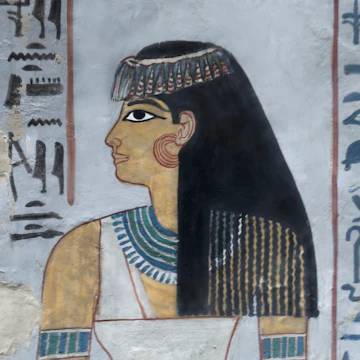 Reliefs showing the mistress of the house and the chantress of Amun at the tomb of Sennefer in Luxor, Egypt.