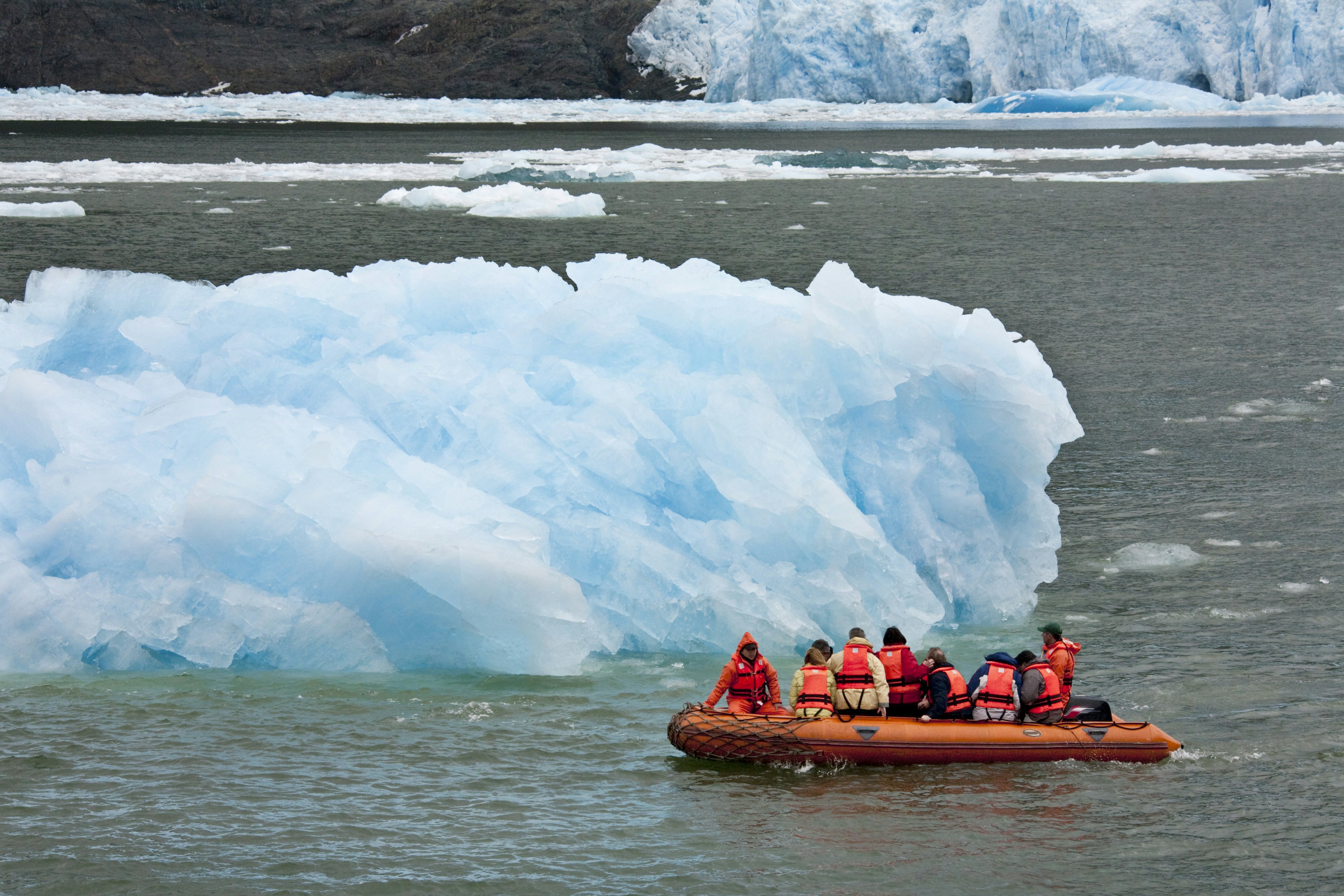 Adventure tourists near the San Rafael Glacier in the Laguna San Rafael National Park in the northern Patagonian Ice Field in southern Chile.
