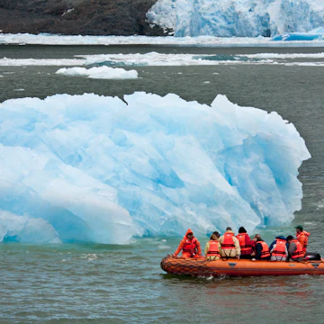 Adventure tourists near the San Rafael Glacier in the Laguna San Rafael National Park in the northern Patagonian Ice Field in southern Chile.