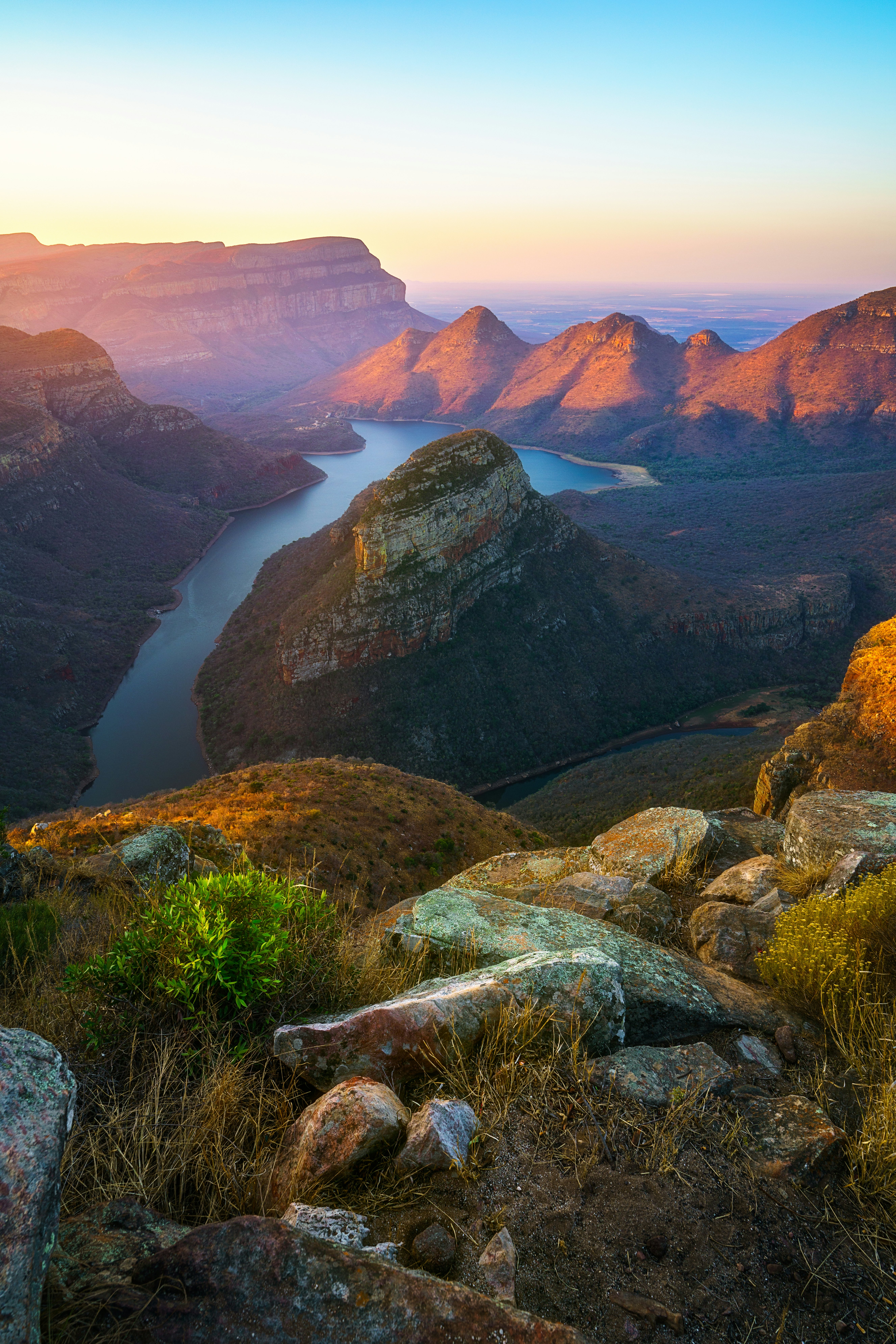 view of three rondavels and the blyde river canyon at sunset in south africa; Shutterstock ID 1536002621; your: Sloane Tucker; gl: 65050; netsuite: Online Editorial; full: POI
1536002621