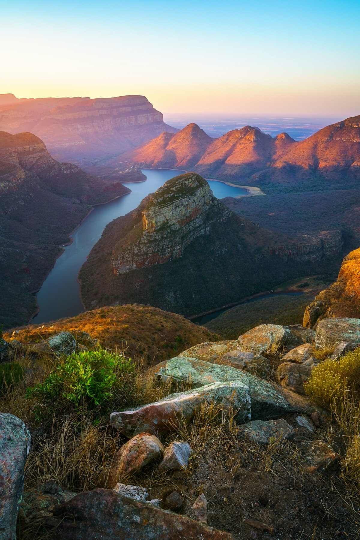 view of three rondavels and the blyde river canyon at sunset in south africa; Shutterstock ID 1536002621; your: Sloane Tucker; gl: 65050; netsuite: Online Editorial; full: POI
1536002621