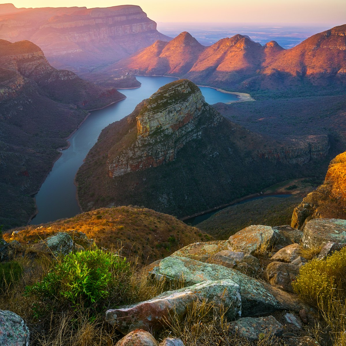 view of three rondavels and the blyde river canyon at sunset in south africa; Shutterstock ID 1536002621; your: Sloane Tucker; gl: 65050; netsuite: Online Editorial; full: POI
1536002621