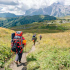 Group hiking in the Mountains of Republic of Adygea with large backpacks. Russia; Shutterstock ID 1660636402; your: Brian Healy; gl: 65050; netsuite: Lonely Planet Online Editorial; full: 7 years to walk the globe
1660636402