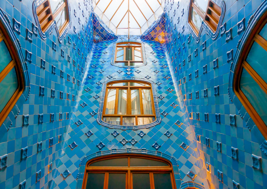 Casa Battló, Barcelona, Spain The blue-tiled interior of the famous Casa Battló building designed by Antonio Gaudi in Barcelona, Spain