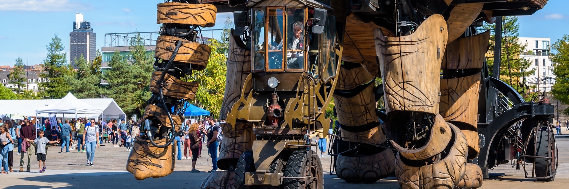 Nantes, France - September 17, 2022: The Great Elephant animated giant puppet, part of the Machines of the Isle of Nantes artistic and tourist attraction, wanders slowly amid onlookers on a sunny day.; Shutterstock ID 2220543875; your: Sloane Tucker; gl: 65050; netsuite: Online Editorial; full: POI
2220543875