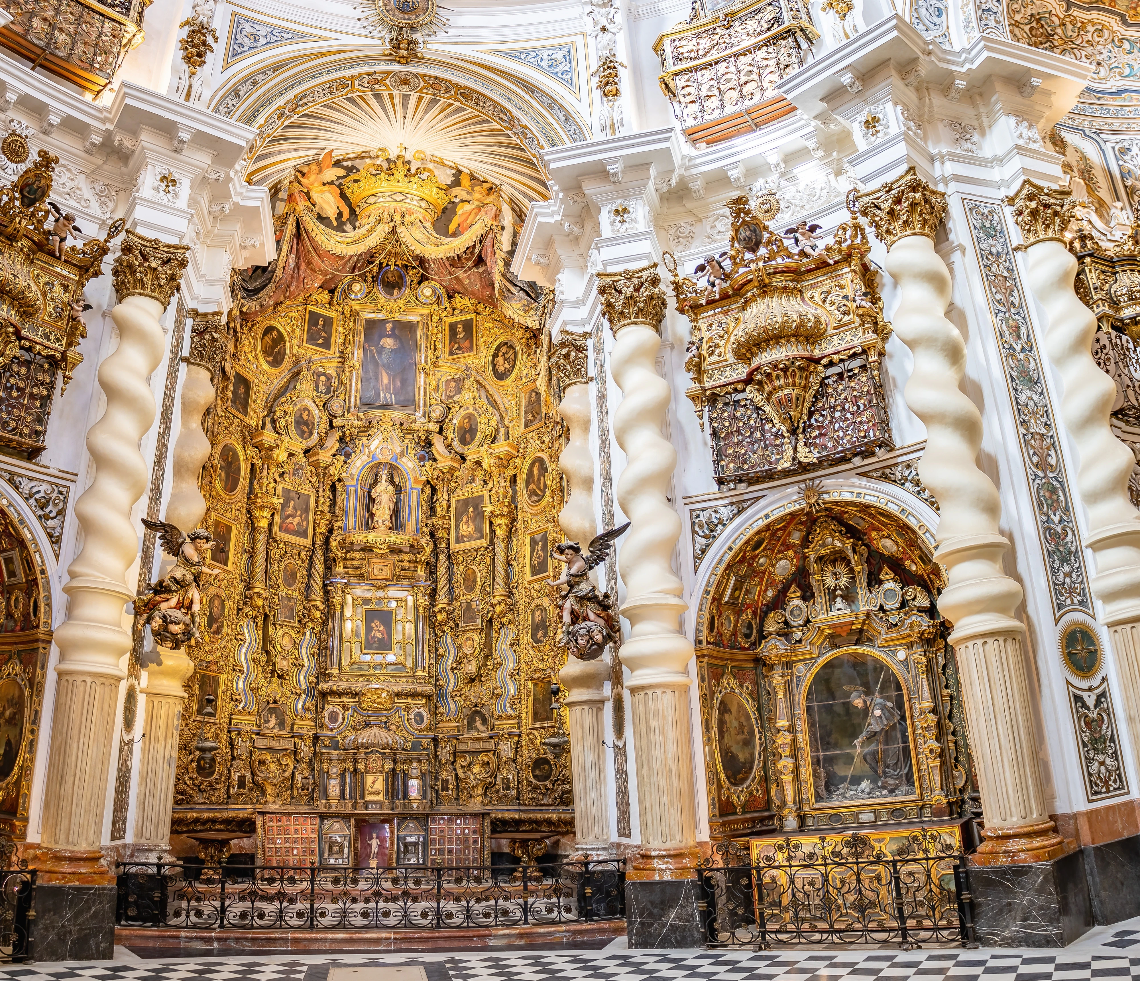 Altarpiece inside the Church of San Luis de los Franceses of baroque architecture from the 18th century in the historic center of Seville, Andalusia, Spain.