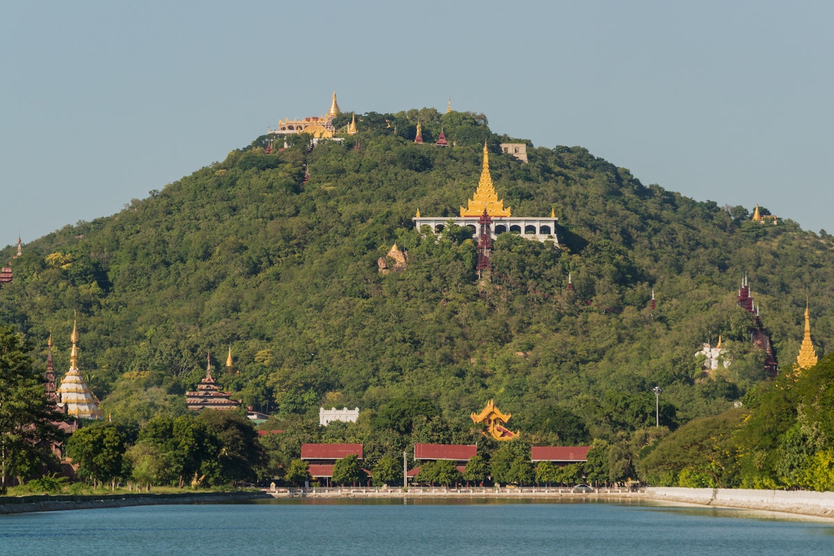 View over the moat of Mandalay Palace to Mandalay Hill with its many temples; Shutterstock ID 241383850; your: Sloane Tucker; gl: 65050; netsuite: Online Editorial; full: POI
241383850