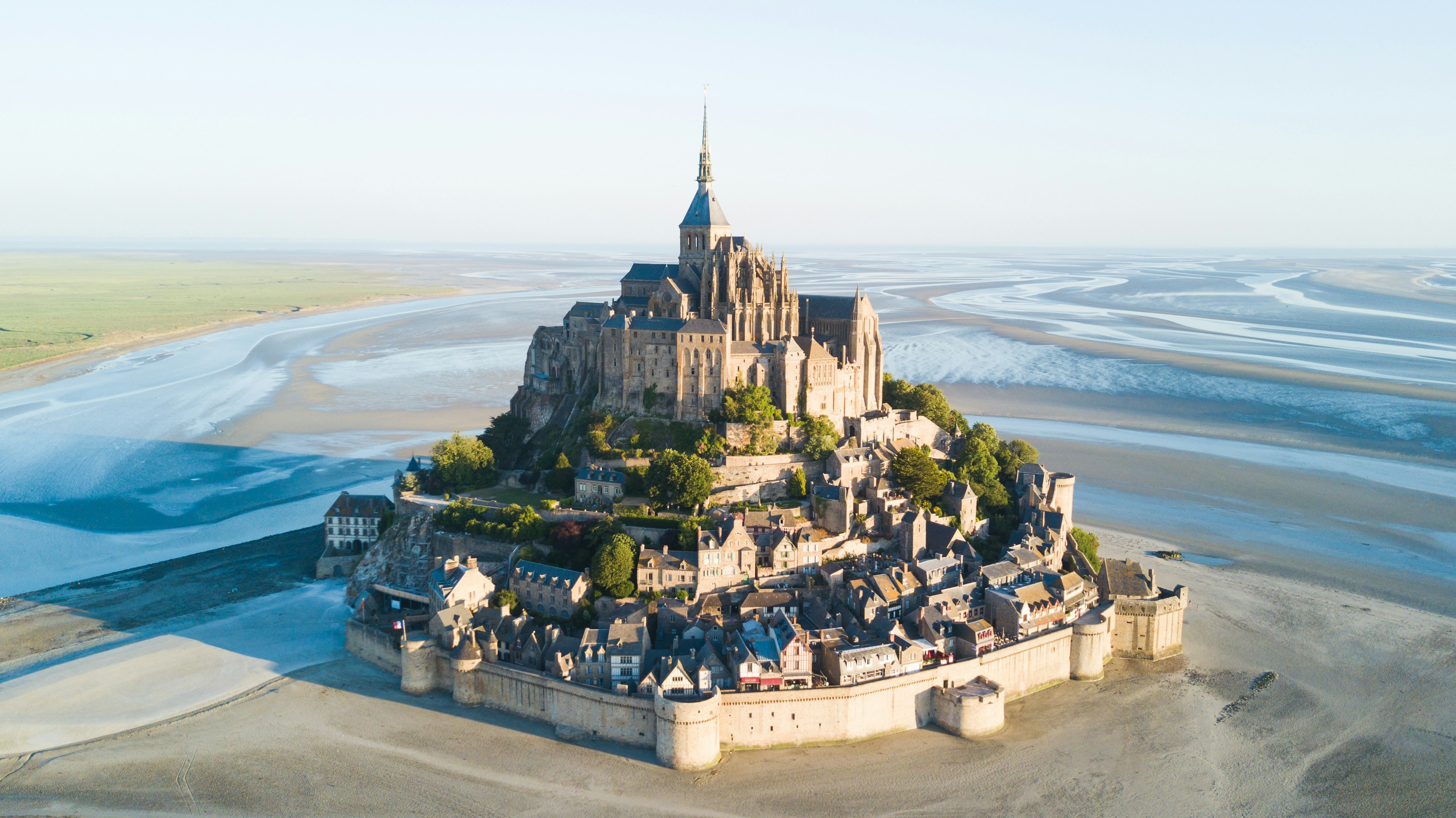 Le Mont Saint-Michel tidal island in beautiful twilight at dusk