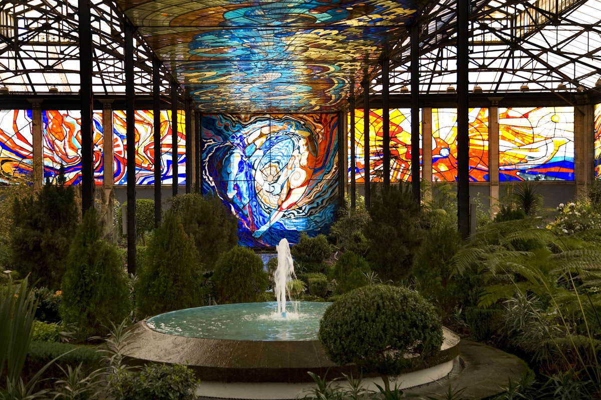 Cosmovitral Botanical Garden in Toluca, Mexico is surrounded by stained glass.