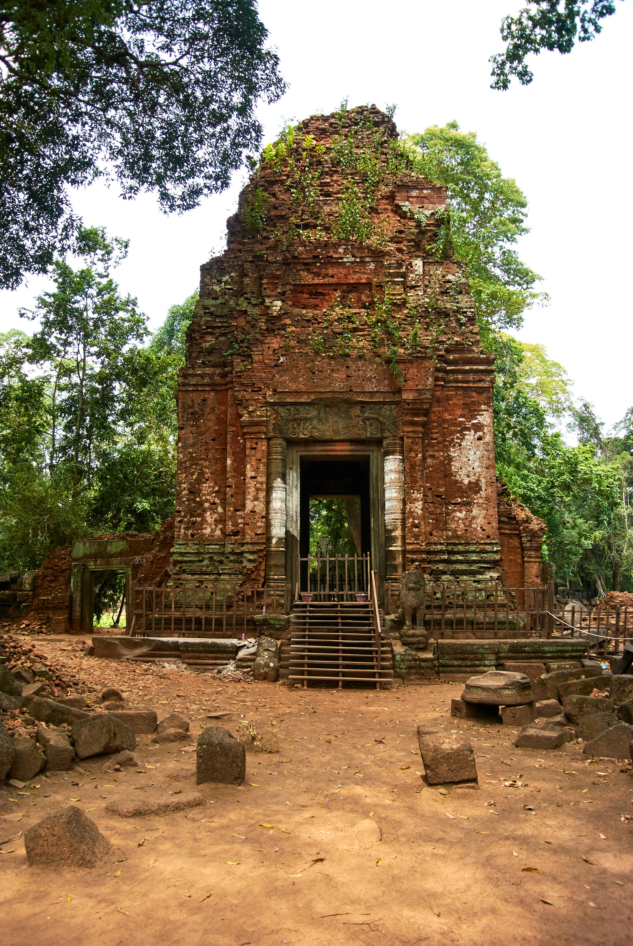 An overgrown ruin in Koh Ker.
1078808336
prasat, thom, ancient, angkor, angkor wat, architecture, art, asia, asian, buddha, buddhism, buddhist, building, cambodia, cambodian, culture, dawn, face, heritage, hindu, hinduism, historical, india, khmer, lake, landmark, laos, meditation, nature, old, pagoda, prayer, reap, religion, religious, ruin, shiva, siam, siem, siem reap, statue, stone, sunrise, sunset, temple, tower, travel, unesco, wat