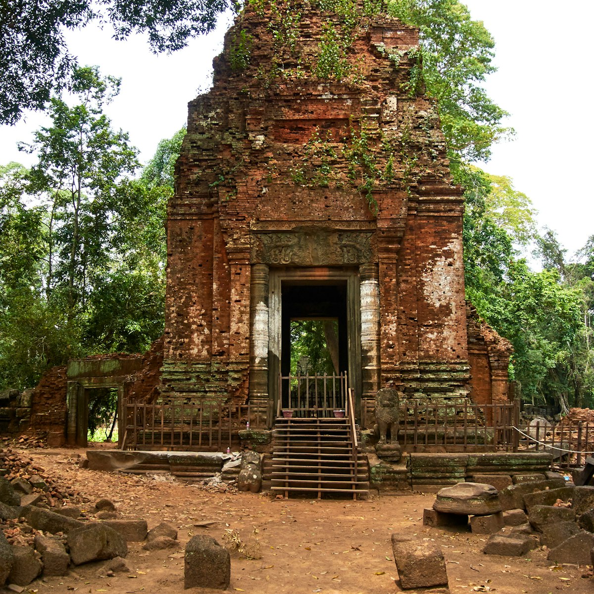 An overgrown ruin in Koh Ker.
1078808336
prasat, thom, ancient, angkor, angkor wat, architecture, art, asia, asian, buddha, buddhism, buddhist, building, cambodia, cambodian, culture, dawn, face, heritage, hindu, hinduism, historical, india, khmer, lake, landmark, laos, meditation, nature, old, pagoda, prayer, reap, religion, religious, ruin, shiva, siam, siem, siem reap, statue, stone, sunrise, sunset, temple, tower, travel, unesco, wat