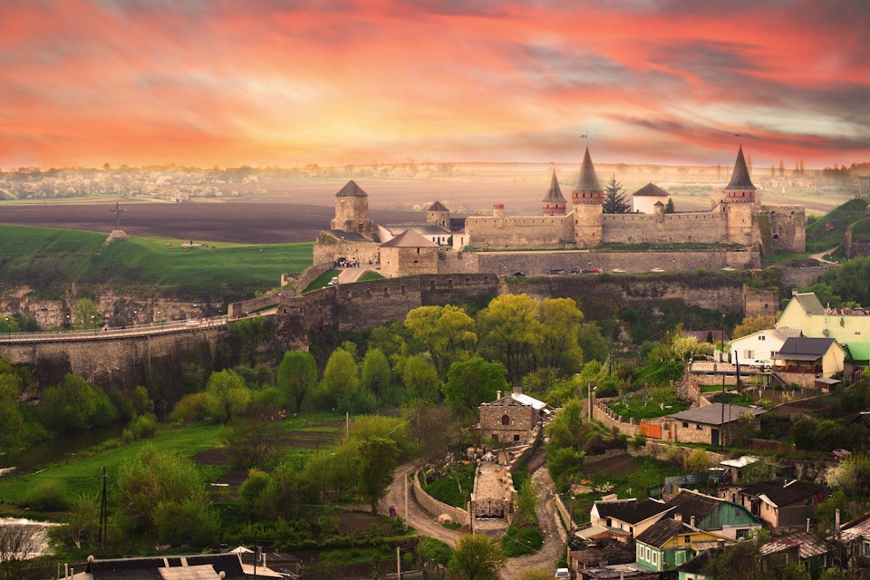 Dramatic view on the castle in Kamianets-Podilskyi in spring. Ukraine
129498389
unusual, cross, medieval, warm, historical, town, travel, view, dramatic, fortified, yellow, awesome, magic, castle, may, orange, old, turrets, evening, traditional, fantasy, multicolored, fortress, interesting, colors, ages, city, ukrainian, towers, ukraine, buildings, sky, places, beautiful, bridge, stunning, landscape, history icon, kamianets, podilskyi, kamjanets, kamenets, podilsky, kamianets-podilskyi, podolsky, kamyanets, kamyanets-podilsky