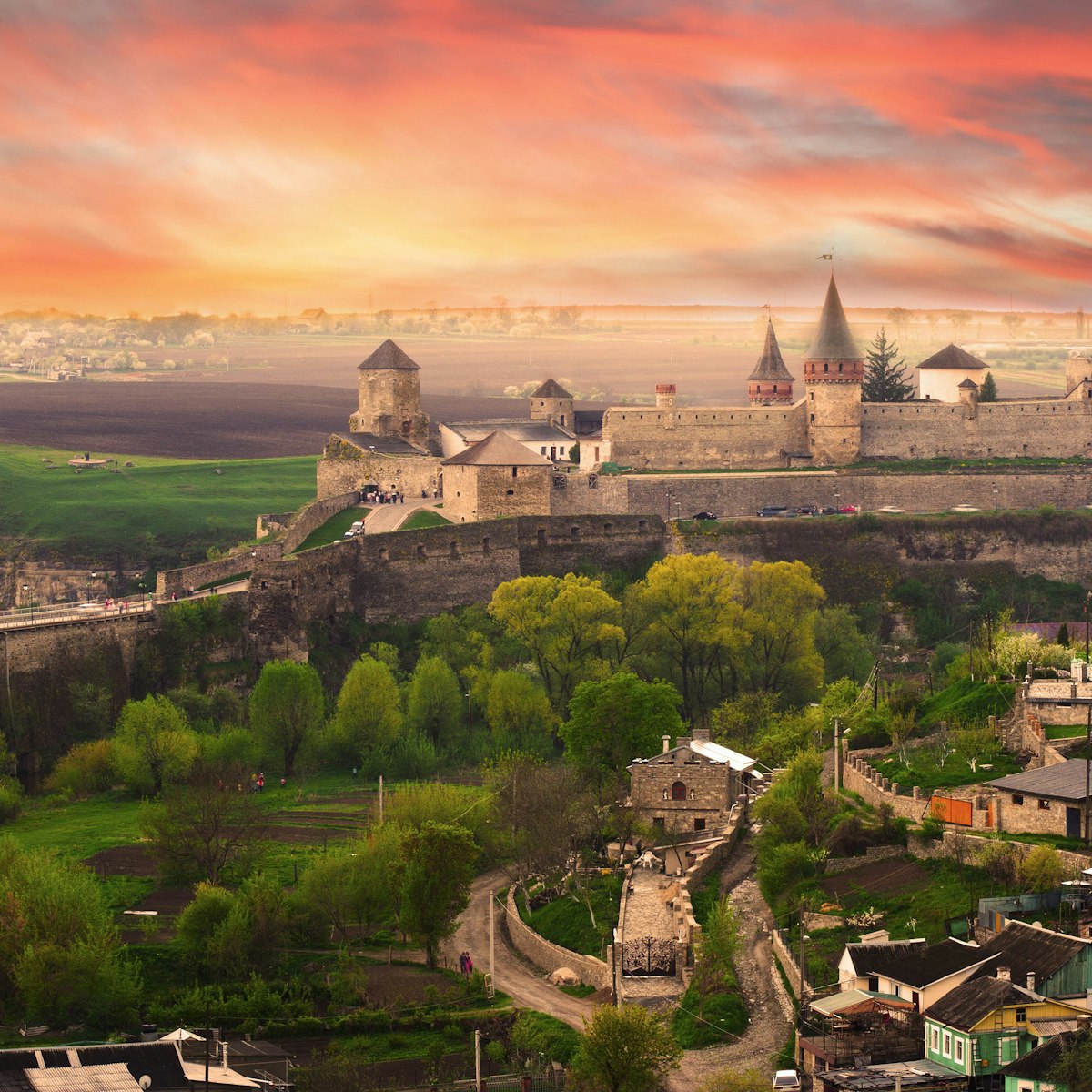 Dramatic view on the castle in Kamianets-Podilskyi in spring. Ukraine
129498389
unusual, cross, medieval, warm, historical, town, travel, view, dramatic, fortified, yellow, awesome, magic, castle, may, orange, old, turrets, evening, traditional, fantasy, multicolored, fortress, interesting, colors, ages, city, ukrainian, towers, ukraine, buildings, sky, places, beautiful, bridge, stunning, landscape, history icon, kamianets, podilskyi, kamjanets, kamenets, podilsky, kamianets-podilskyi, podolsky, kamyanets, kamyanets-podilsky
