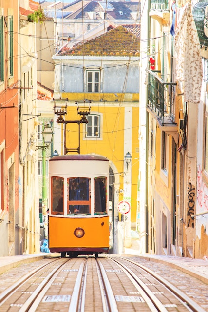 Lisbon's Gloria funicular classified in Bairro Alto in Lisbon, Portugal
244165612
downtown, uphill, street, electric, houses, national, european, central, urban, yellow, tramway, steep, history, streetcar, cable, lisbon, hills, rail, commute, train, portugal, gloria, funicular, elevator, historic, transport, center, architecture, city, colorful, public, railway, buildings, tram, connect, transportation, antique, track, car, vintage, tight, alley, monument, europe, cityscape, alfama, lisboa