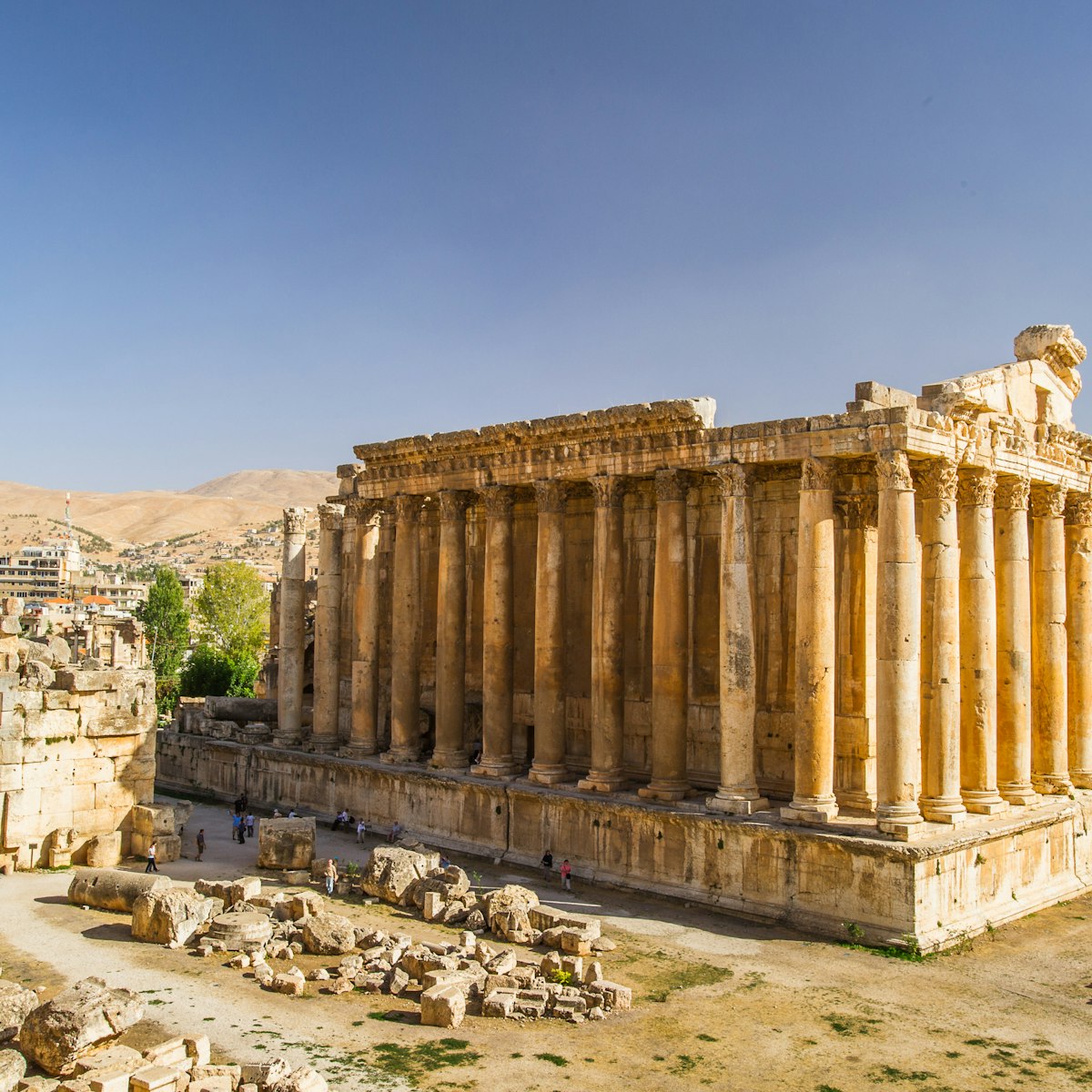 The Temple of Bacchus at Baalbek in Lebanon.
256443700
outdoor, empire, town, stone, jupiter, travel, rock, past, archeology, column, landmark, middle, valley, summer, east, old, roman, morning, sun, asia, building, lebanon, wall, world, unesco, famous, architecture, city, blue, temple, ruin, heliopolis, sky, lebanese, tourism, religion, mediterranean, ancient, arab, structure, landscape, baalbeck, baalbek, bekaa