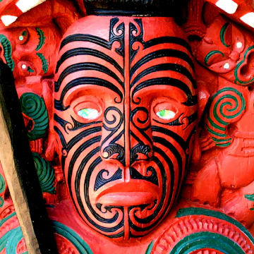 Red carving of a Maori Warrior.
26083891
polynesian, cultural, waitangi, warrior, zealand, culture, carving, ground, tattoo, native, treaty, paint, maori, male, face, wood, luck, art, new, red