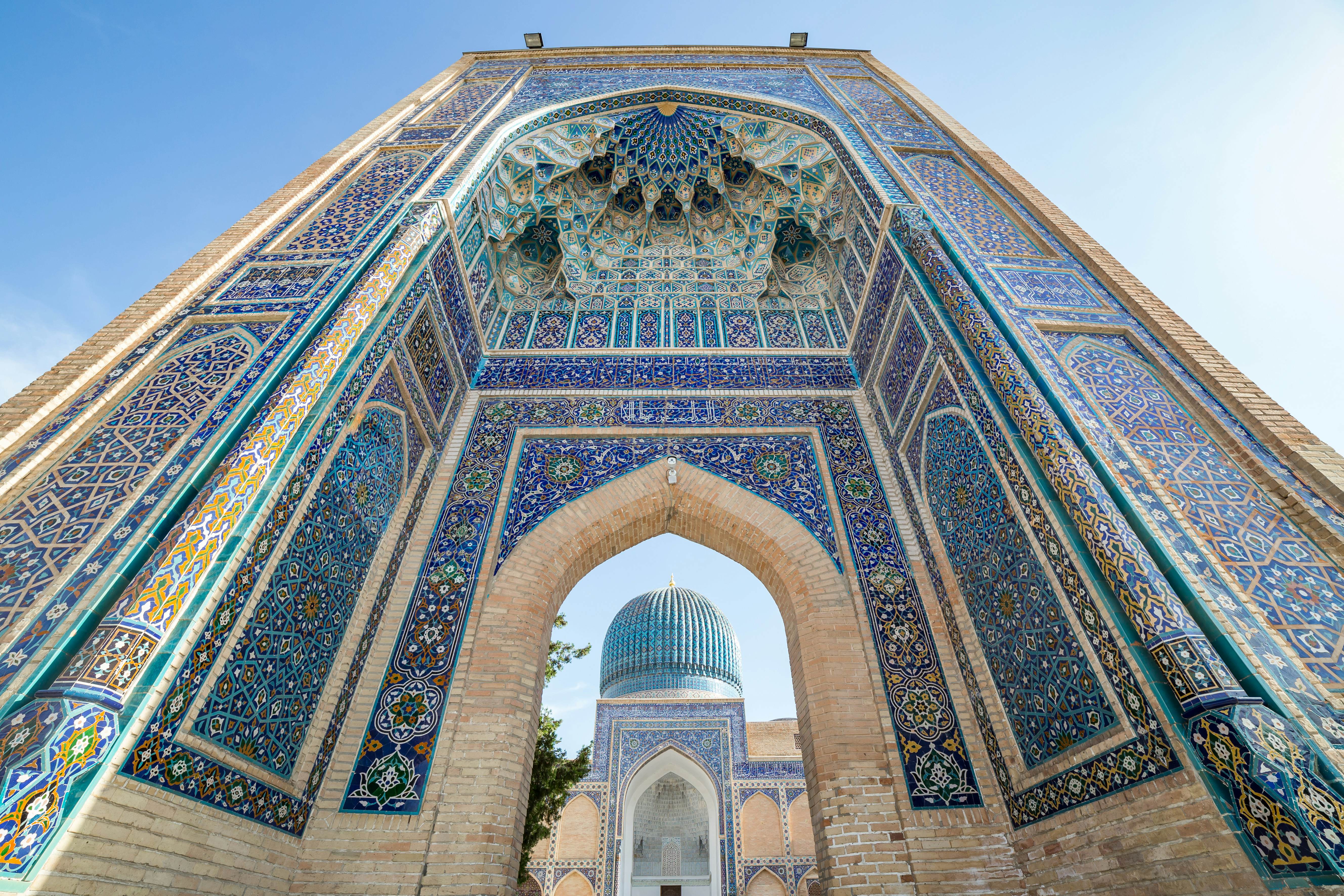 Uzbek Muslim women praying inside Gur-i Amir or Guri Amir mausoleum of the  Turco-Mongol conqueror Timur also known as Tamerlane in the city of  Samarkand alternatively Samarqand in Uzbekistan Stock Photo 