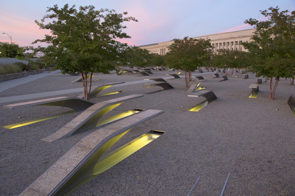The Pentagon Memorial features 184 empty benches at sunset, a memorial to commemorate the anniversary of the September 11th attacks, in Arlington, Virginia.