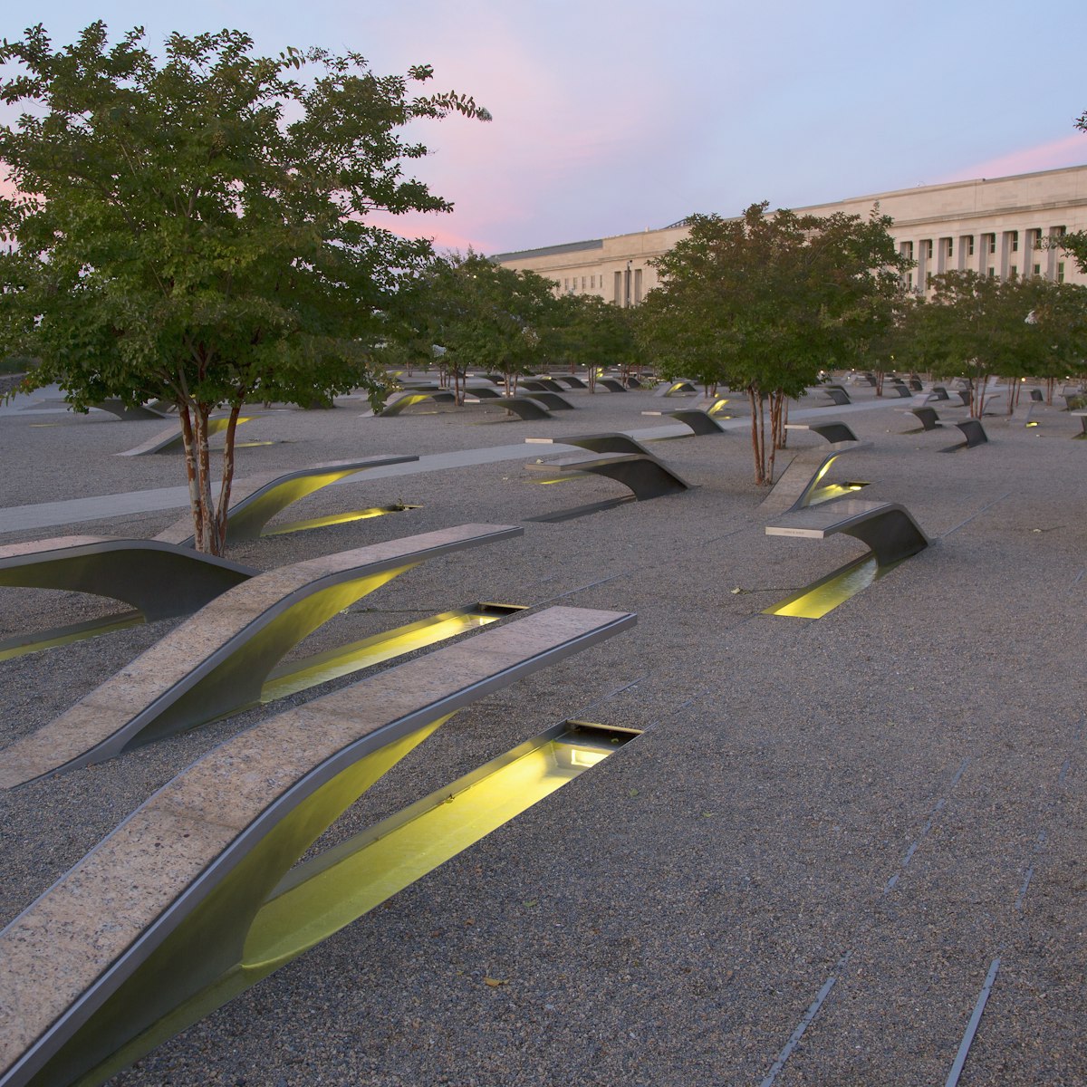 The Pentagon Memorial features 184 empty benches at sunset, a memorial to commemorate the anniversary of the September 11th attacks, in Arlington, Virginia.