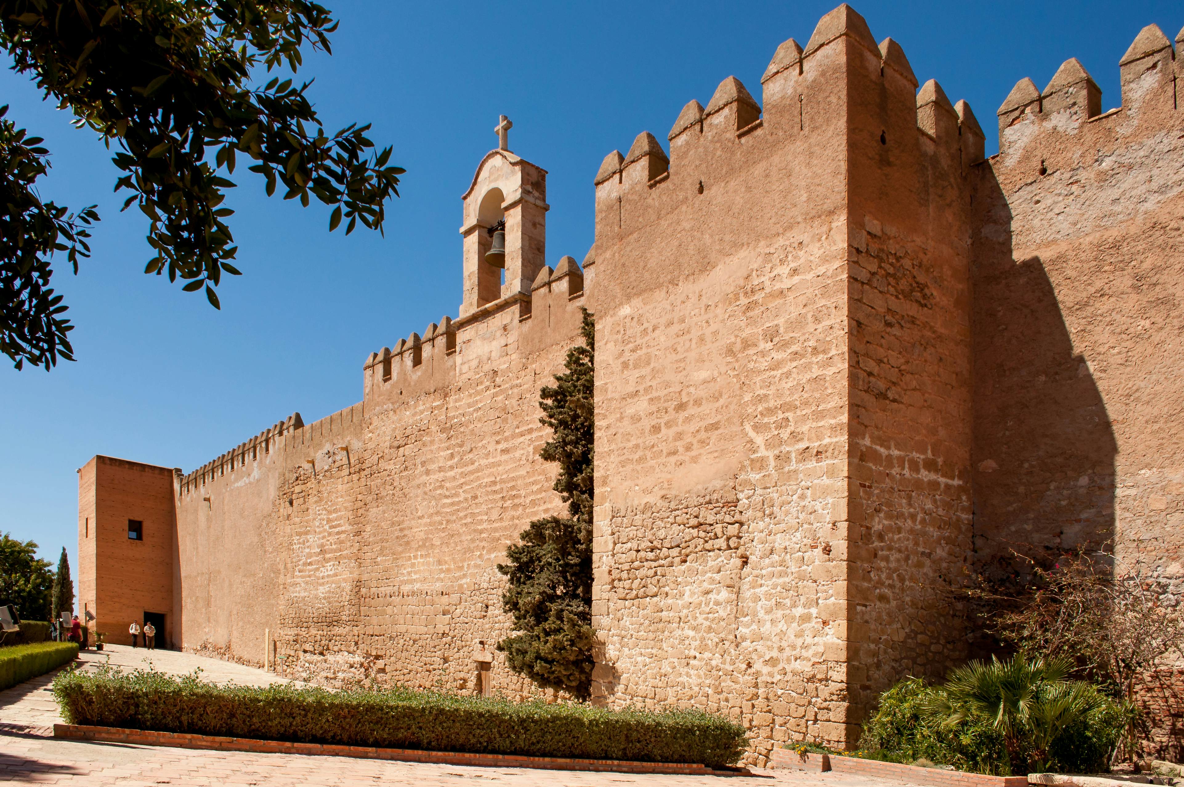 The sail wall with its bell, which separates the first and second enclosures of the fortress in Alcazaba, Almeria, Spain.