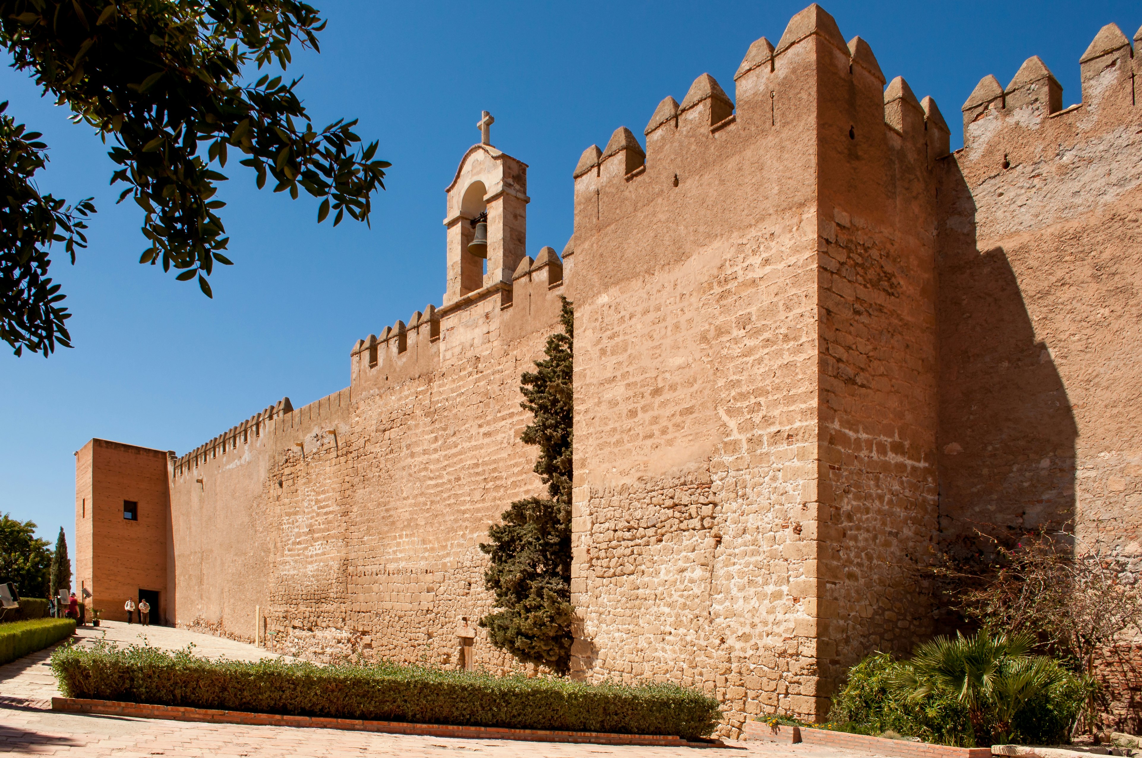 The sail wall with its bell, which separates the first and second enclosures of the fortress in Alcazaba, Almeria, Spain.