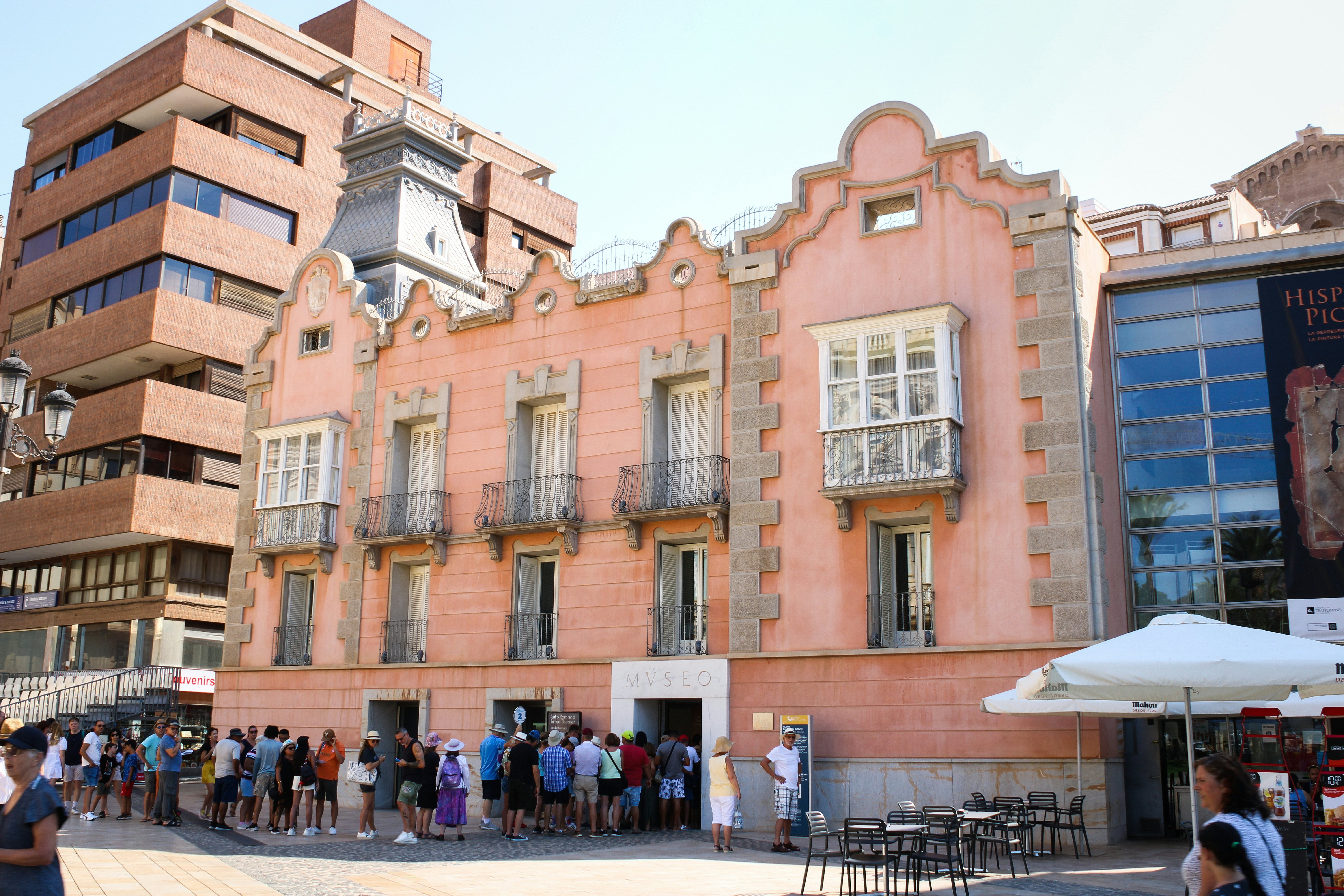 Visitors in front of the Roman Theater Museum in Cartagena, Spain.
