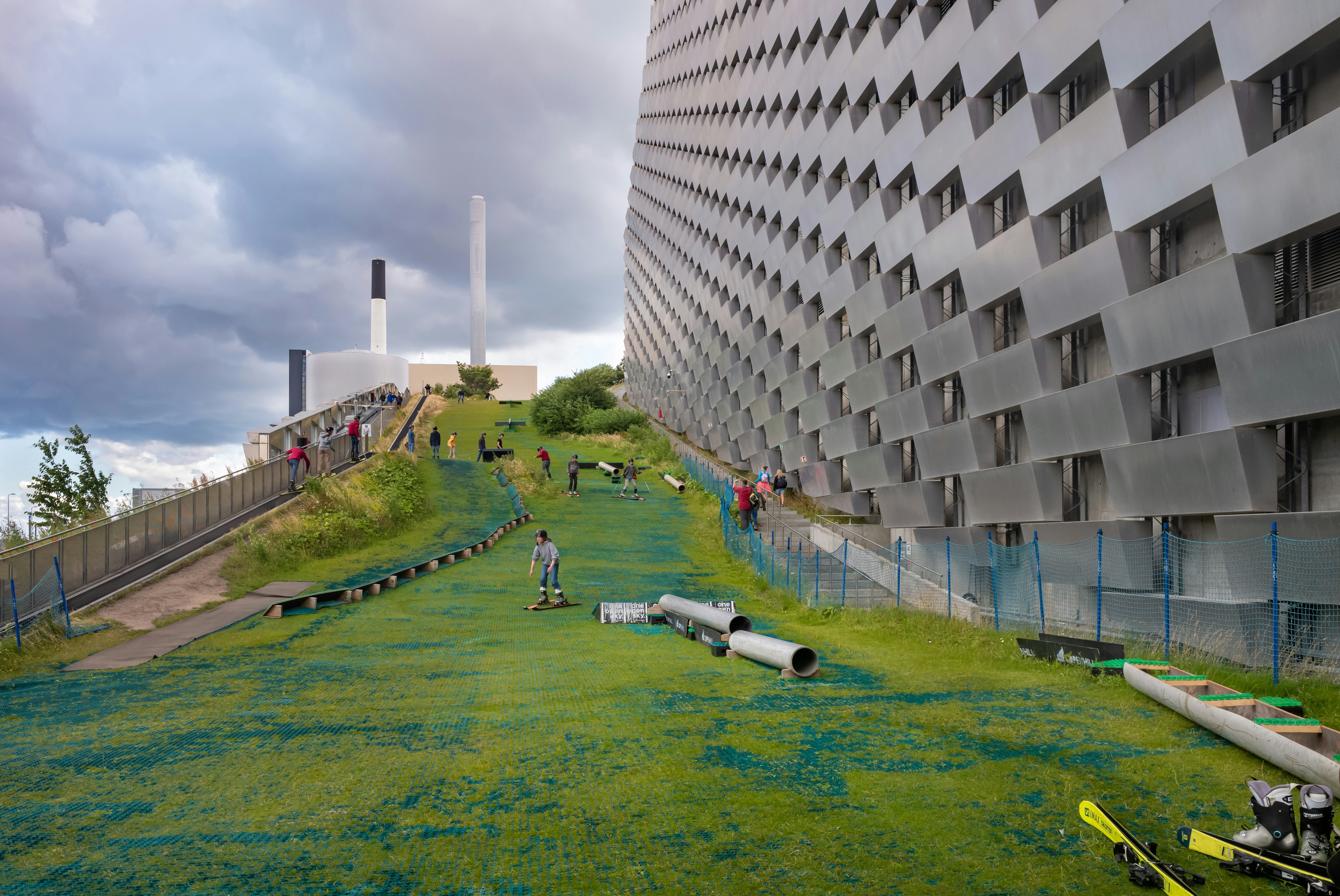 Green ski slopes of the Amager Bakke, Copenhill Waste-to-Energy Power Plant in Copenhagen, Denmark.