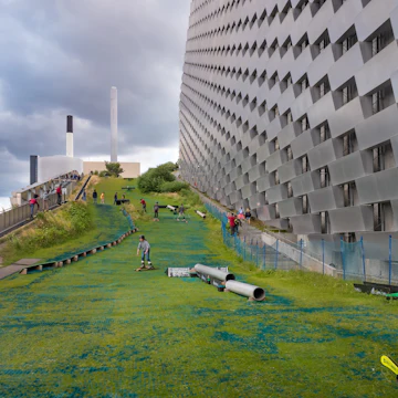 Green ski slopes of the Amager Bakke, Copenhill Waste-to-Energy Power Plant in Copenhagen, Denmark.