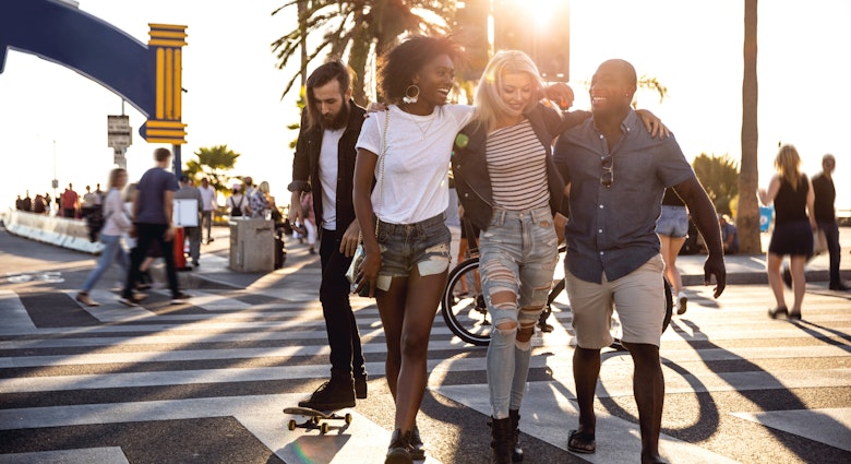 Group of friends in Santa Monica - Los Angeles - Have fun during a vacation
1159412306
A group of friend laughing as they walk along a street in Santa Monica together