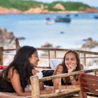 Bai Xep is a quiet remote fishing village off the tourist path, 10km from the major city of Qui Nhon. Girlfriends relax by the oceanside harbor as sunset approaches.
1164215497
beautiful girl