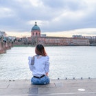 Asian woman sitting Garonne river and Dome de la Grave in Toulouse, France
1197666281