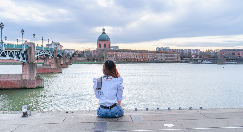 Asian woman sitting Garonne river and Dome de la Grave in Toulouse, France
1197666281