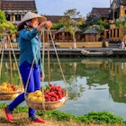 Vietnamese woman selling tropical fruits, old town in Hoi An city, Vietnam. Hoi An is situated on the east coast of Vietnam. Its old town is a UNESCO World Heritage Site because of its historical buildings.
1224548888