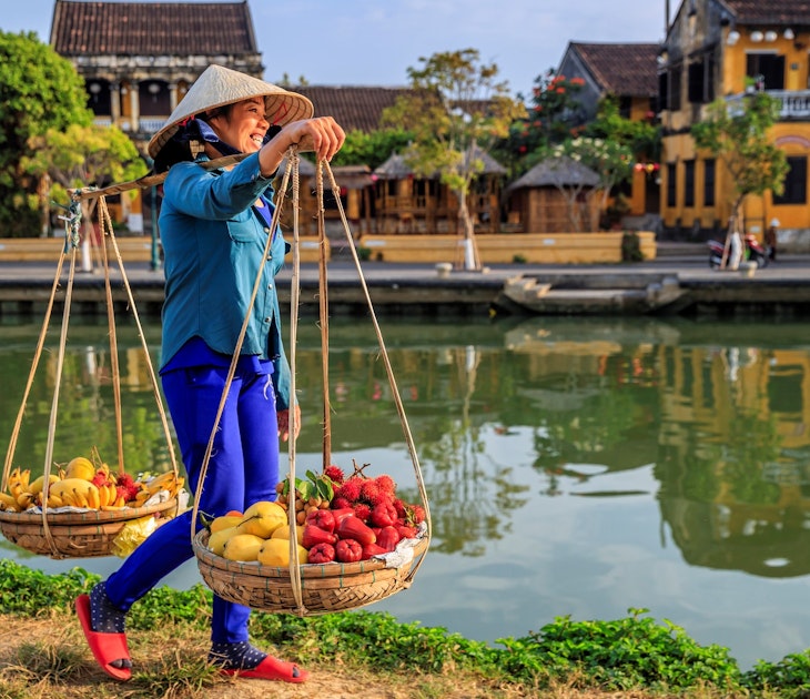 Vietnamese woman selling tropical fruits, old town in Hoi An city, Vietnam. Hoi An is situated on the east coast of Vietnam. Its old town is a UNESCO World Heritage Site because of its historical buildings.
1224548888