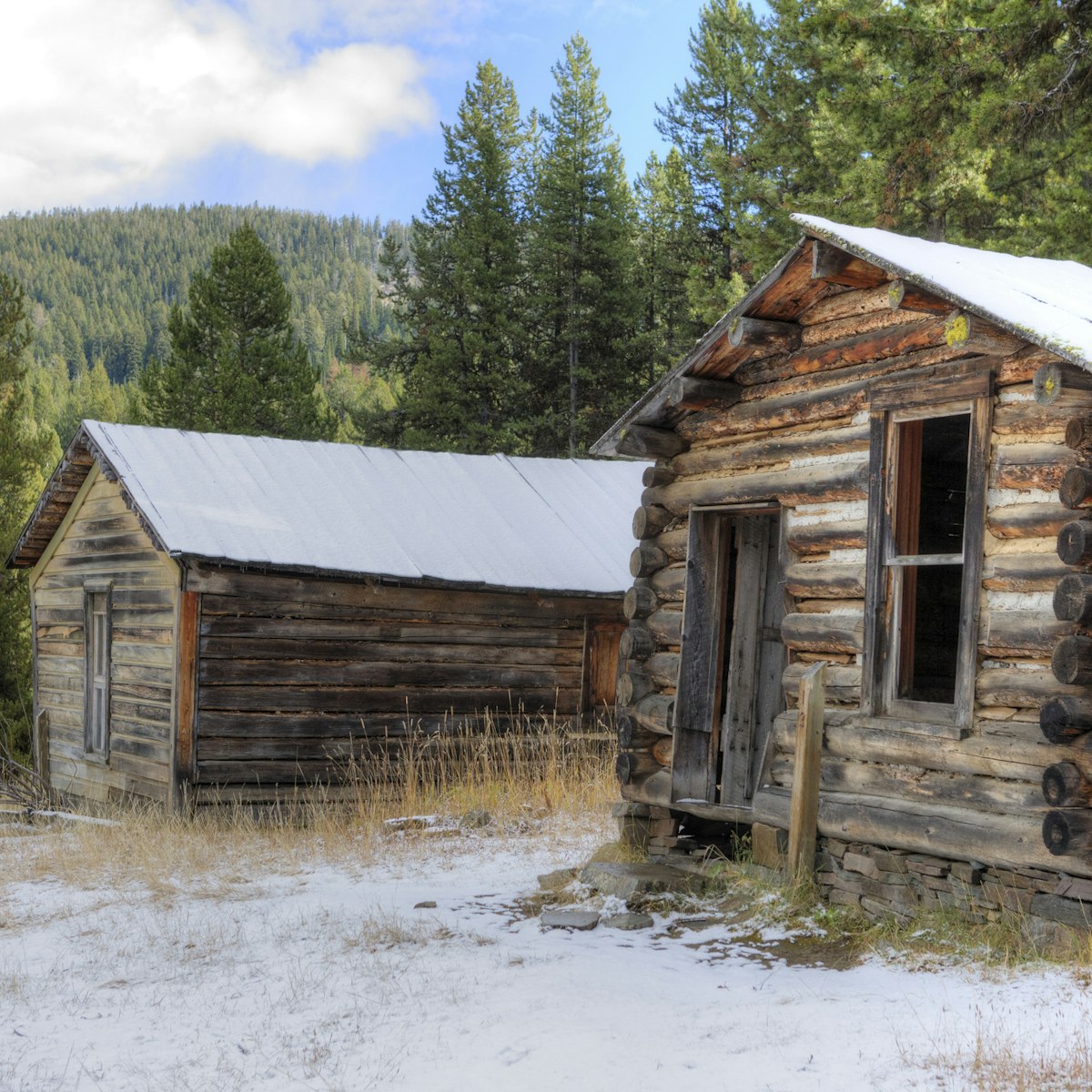 Miners' cabins in a ghost town at 6000 ft elevation in the Montana wilderness. Photographed five years before the town was added to the National Register of Historic Places.
1296758705